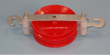 Two Pulleys in Alignment with Metal Frame and Hooks
